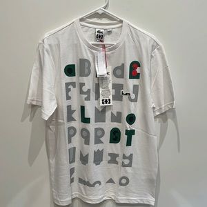 Brand new Lacoste tee (A-Z)